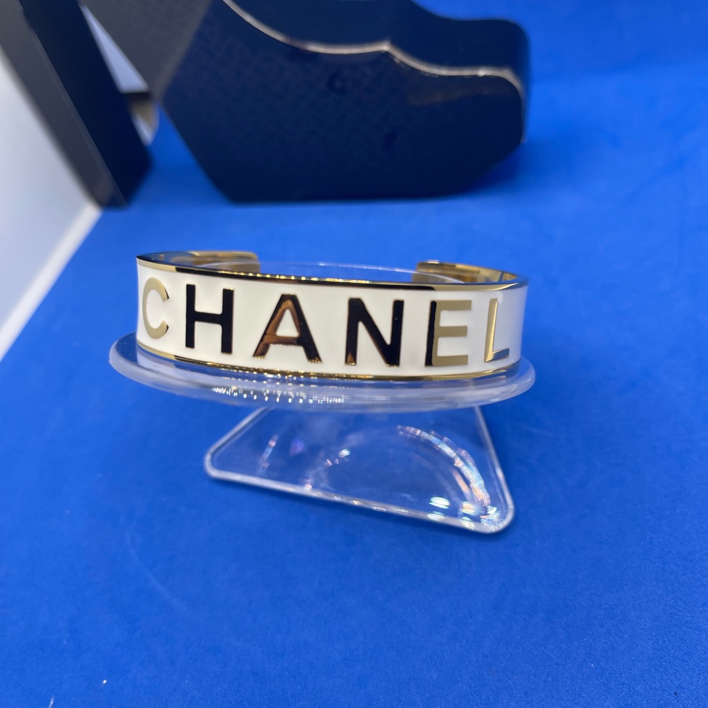 Preowned Authentic Chanel Cuff - White And Gold